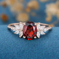 Oval cut garnet Cluster Engagement ring