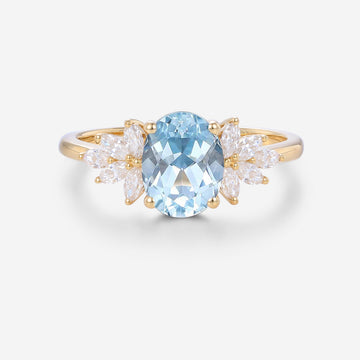 Oval cut Aquamarine Cluster Engagement ring