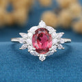 Oval cut Tourmaline Cluster Engagement ring