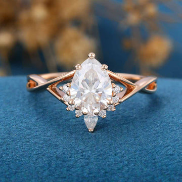 Pear cut Moissanite Twisted Shank Engagement Ring