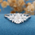 Pear cut Moissanite Cluster Engagement ring