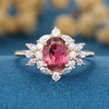 Oval cut Tourmaline Cluster Engagement ring