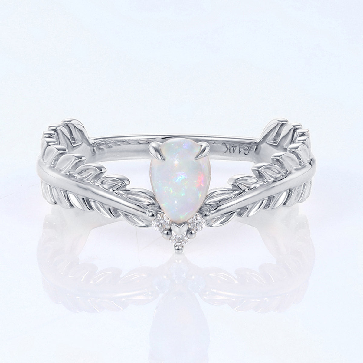 Nature Inspired Pear cut Moissanite Leaf Gold Engagement Ring