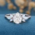 1.2Carat Pear cut Moissanite Cluster Engagement ring