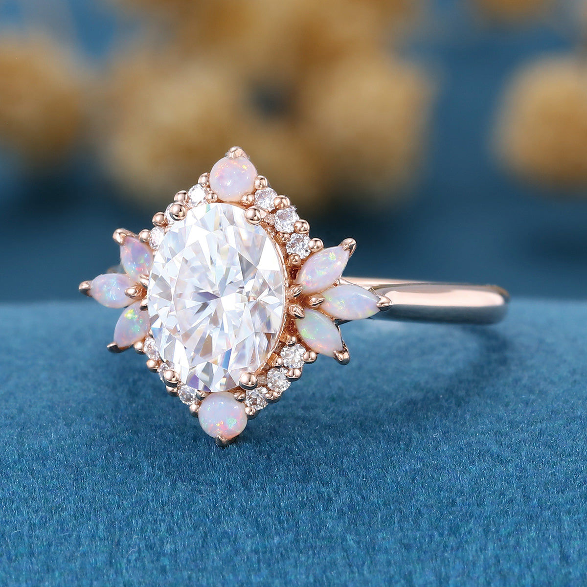 Oval cut Moissanite + Opalrose gold engagement ring