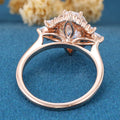 Oval cut Moissanite + Opalrose gold engagement ring