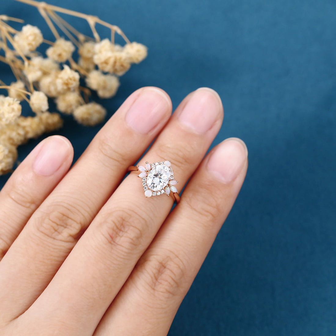 Oval cut Moissanite + Opalrose gold engagement ring