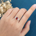 Oval cut garnet Cluster Engagement ring