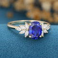 Oval cut Sapphire Cluster Engagement ring