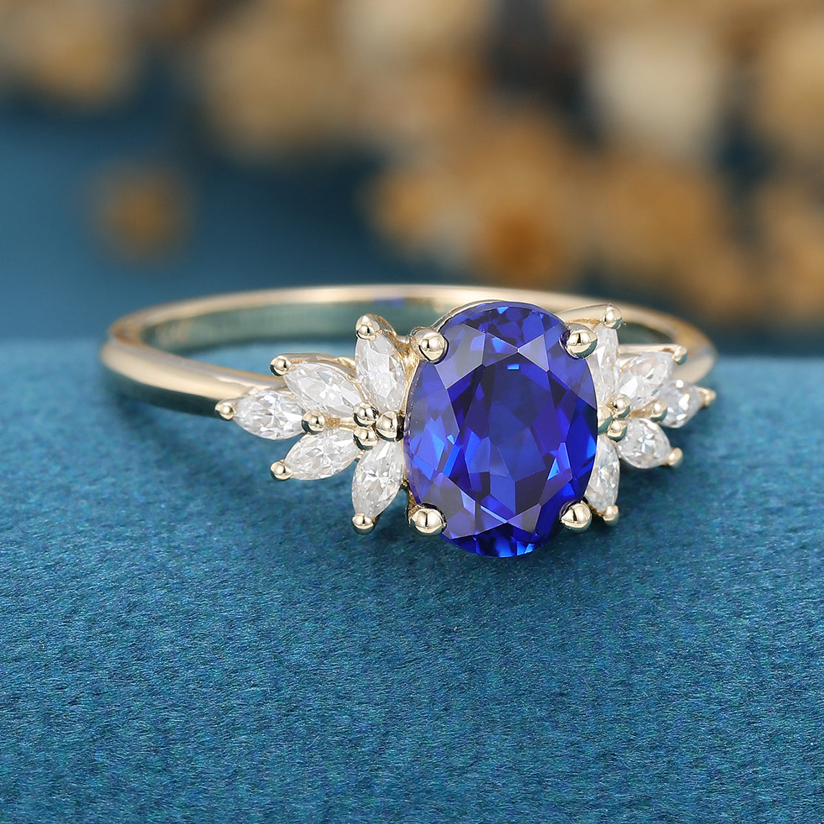 Oval cut Sapphire Cluster Engagement ring