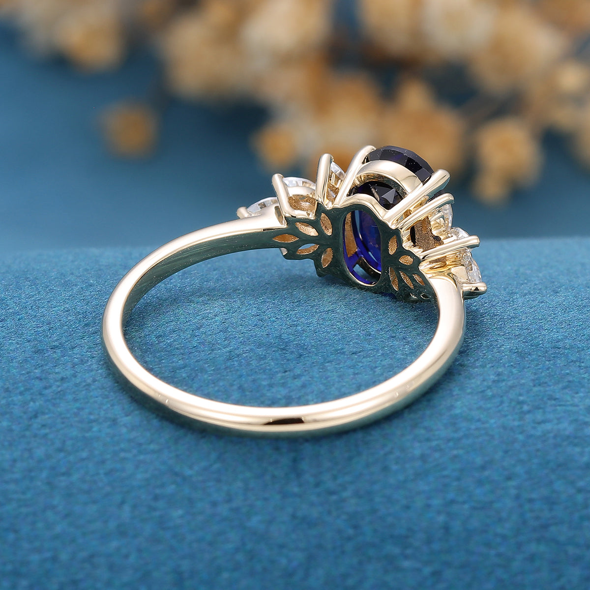 Oval cut Sapphire Cluster Engagement ring