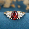 Oval cut garnet Cluster Engagement ring