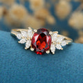 Oval cut garnet Cluster Engagement ring