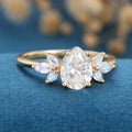 1.25 Carat Pear cut Moissanite Cluster Engagement ring