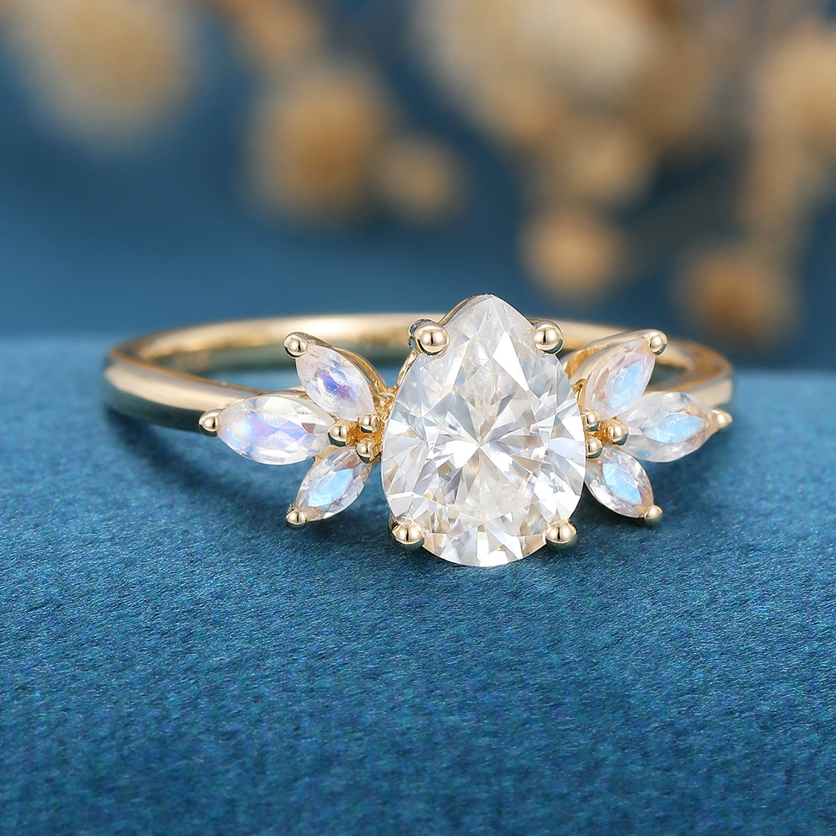 1.25 Carat Pear cut Moissanite Cluster Engagement ring
