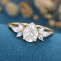 1.25 Carat Pear cut Moissanite Cluster Engagement ring