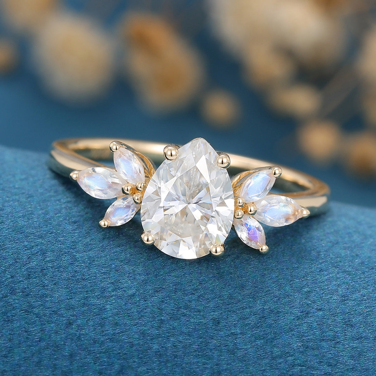 1.25 Carat Pear cut Moissanite Cluster Engagement ring