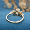 1.25 Carat Pear cut Moissanite Cluster Engagement ring