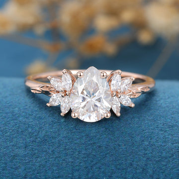Pear cut Moissanite Cluster Engagement ring