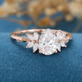 Pear cut Moissanite Cluster Engagement ring