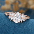 Pear cut Moissanite Cluster Engagement ring