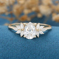 Pear cut Moissanite Cluster Engagement ring