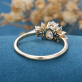 Pear cut Moissanite Cluster Engagement ring