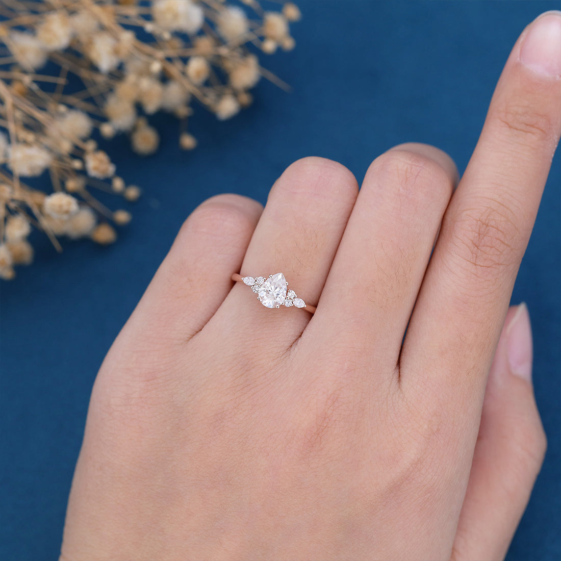 1.25 Carat Pear cut Moissanite Cluster Engagement ring