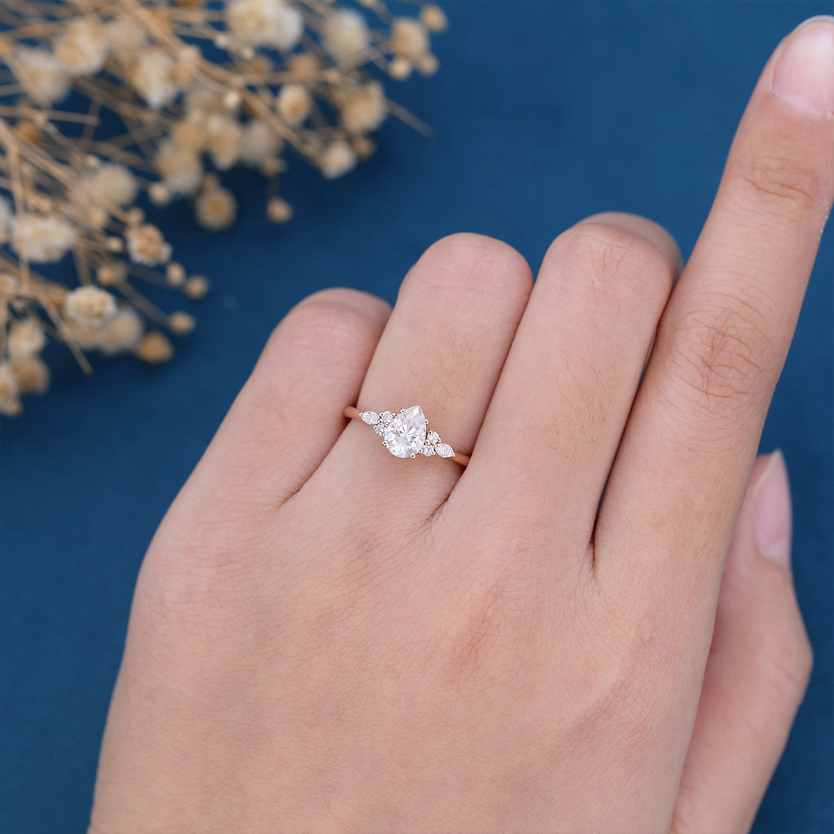 1.25 Carat Pear cut Moissanite Cluster Engagement ring