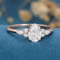 1.25 Carat Pear cut Moissanite Cluster Engagement ring