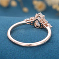1.25 Carat Pear cut Moissanite Cluster Engagement ring