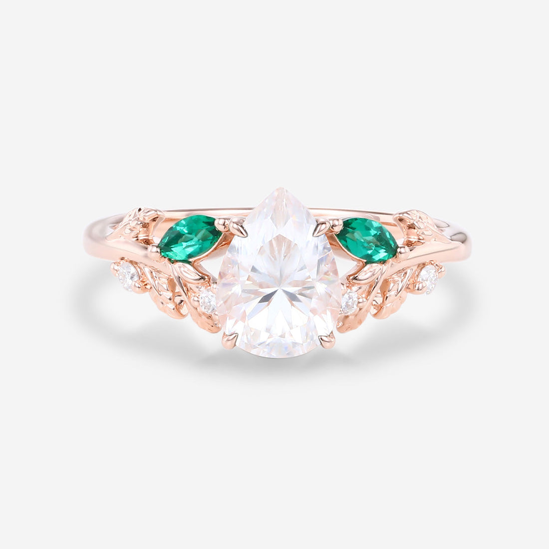 Pear cut Moissanite + Lab Emerald Engagement Ring