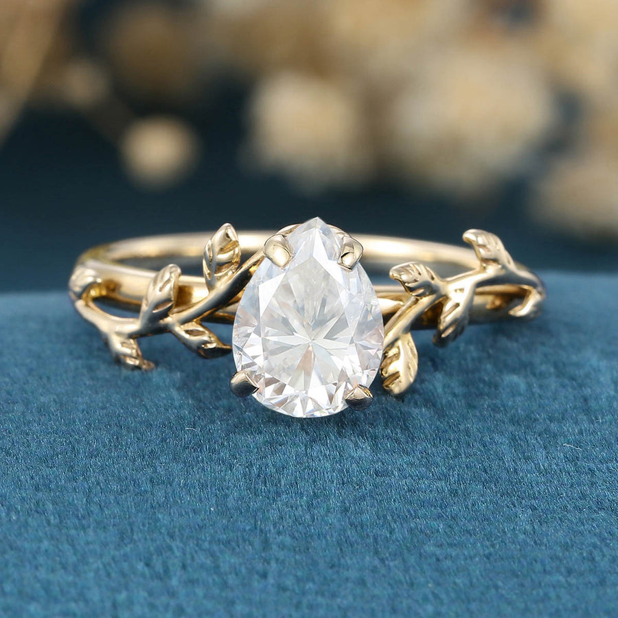 Nature Inspired Pear cut Moissanite Leaf Gold Engagement Ring