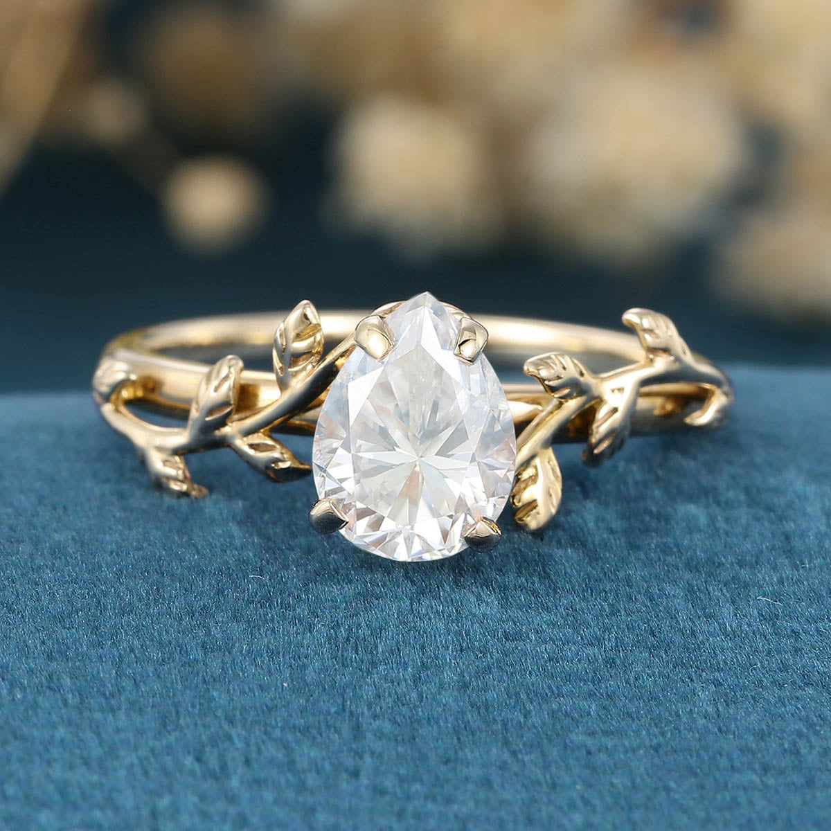 Nature Inspired Pear cut Moissanite Leaf Gold Engagement Ring