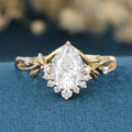 Nature Inspired Pear cut Moissanite Leaf Gold Engagement Ring