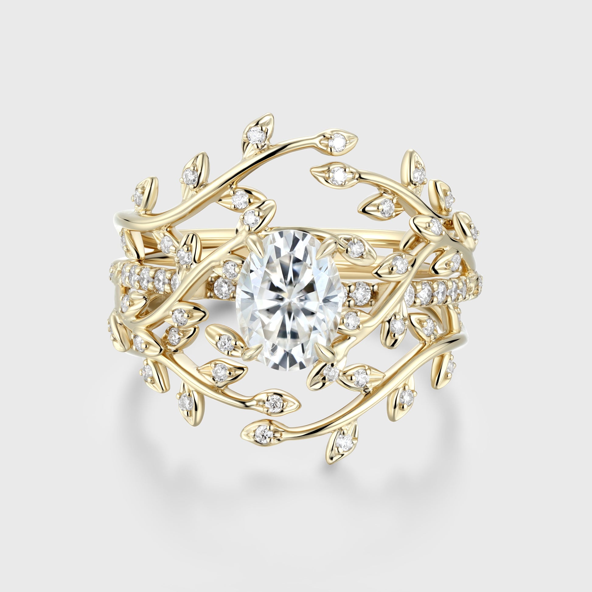 Nature Inspired Oval cut Moissanite Leaf Gold ring set