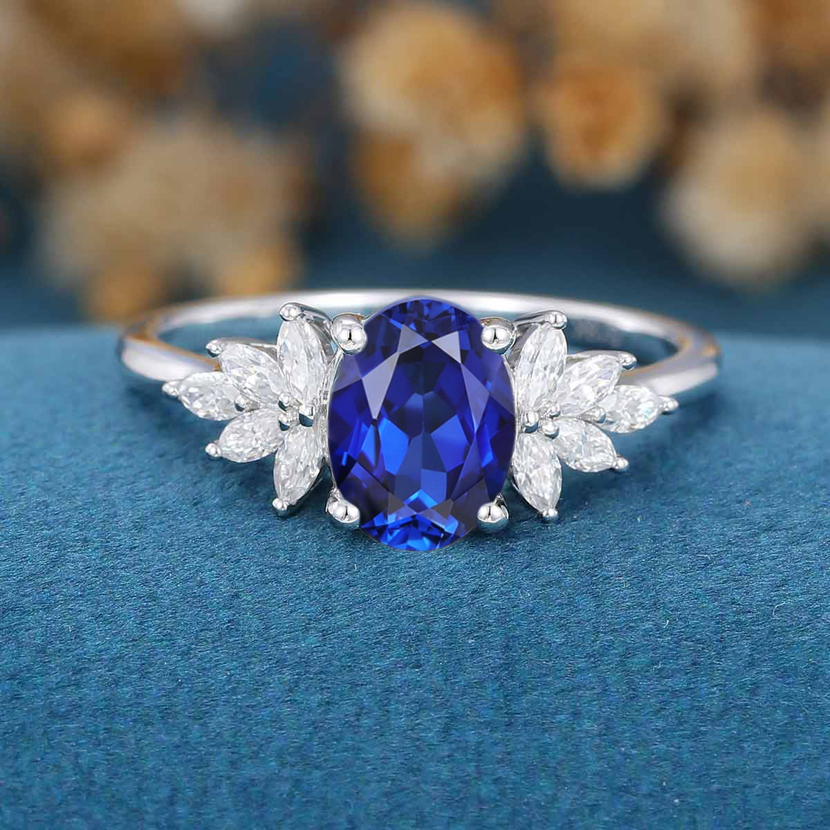 Oval cut Sapphire Cluster Engagement ring