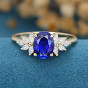 Oval cut Sapphire Cluster Engagement ring