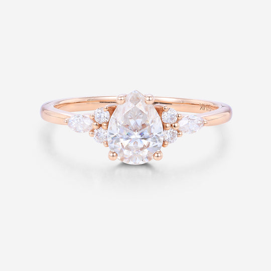 1.25 Carat Pear cut Moissanite Cluster Engagement ring