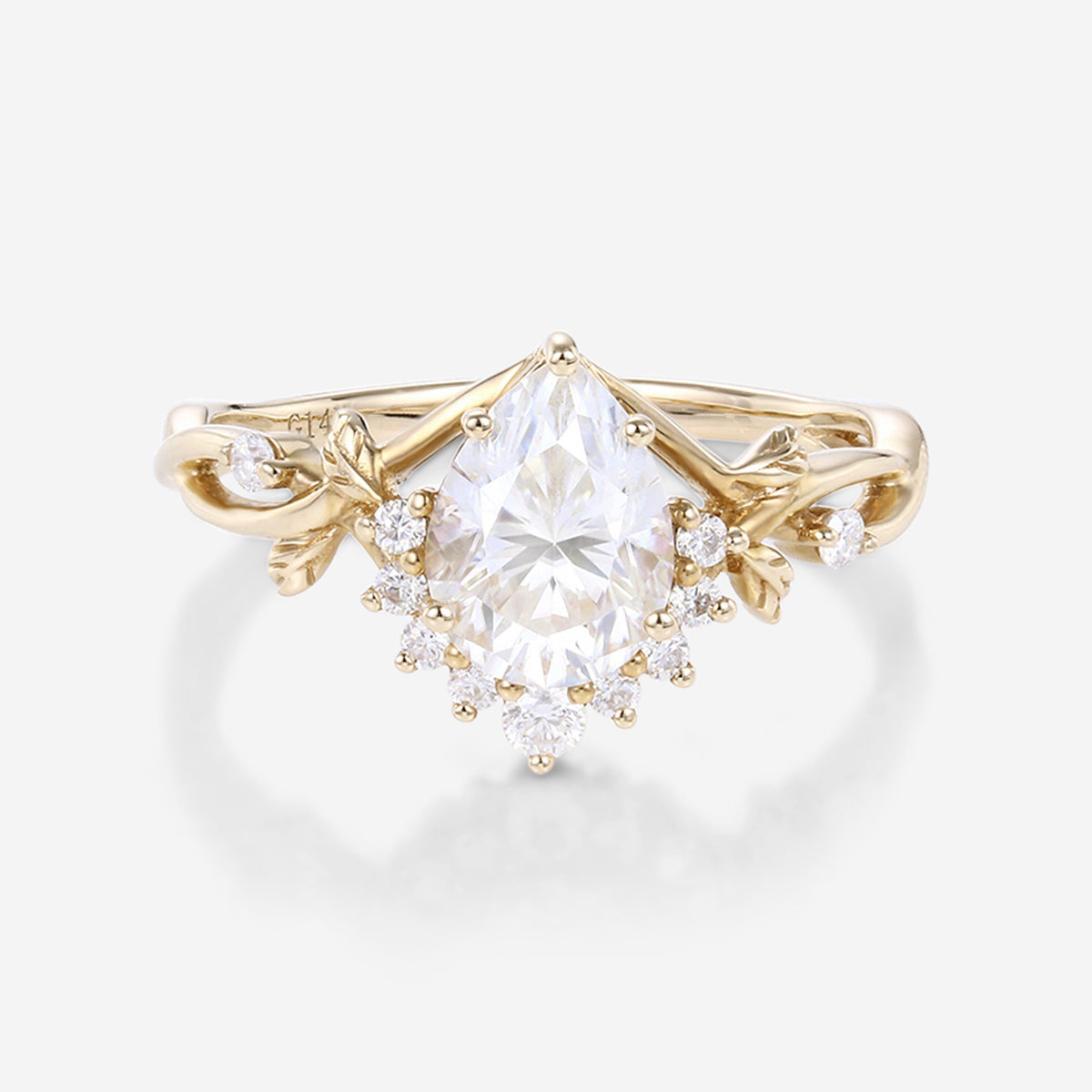 Nature Inspired Pear cut Moissanite Leaf Gold Engagement Ring