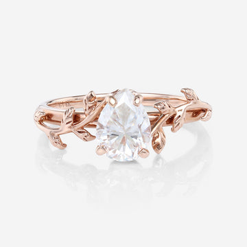 Nature Inspired Pear cut Moissanite Leaf Gold Engagement Ring