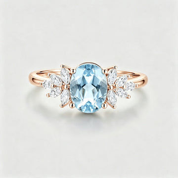 Oval cut Aquamarine Cluster Engagement ring