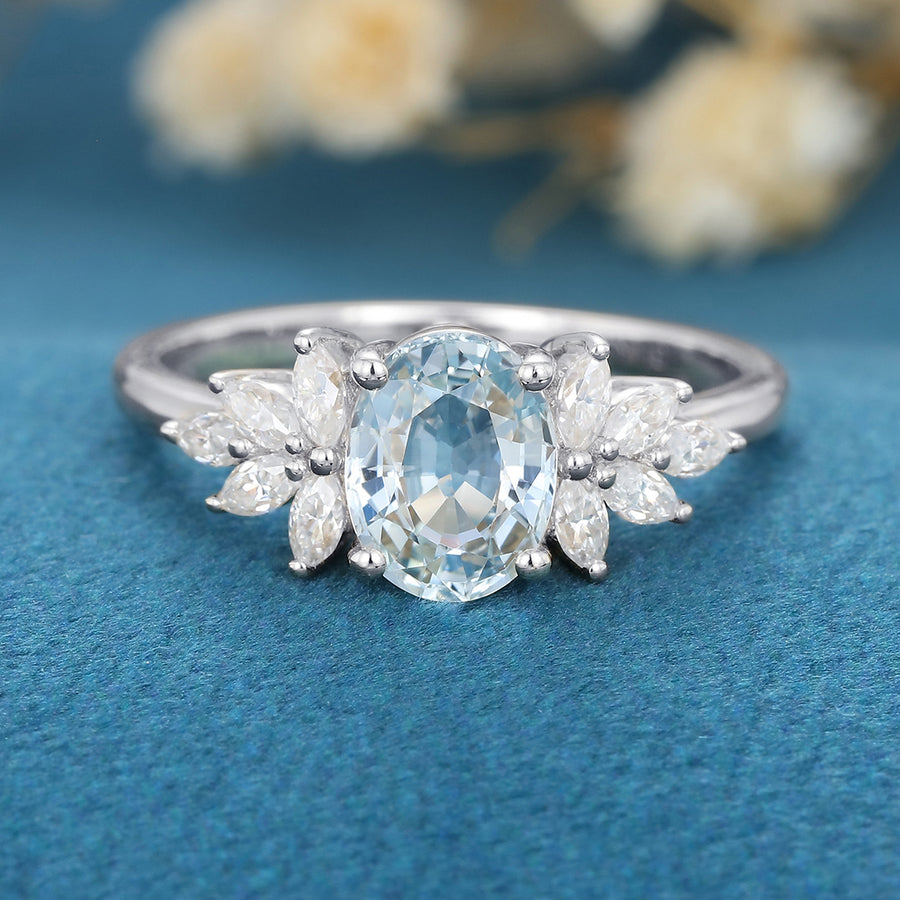 Oval cut Aquamarine Cluster Engagement ring