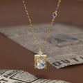 Oval cut Moonstone Pendant Necklace with Diamonds Halo Accents