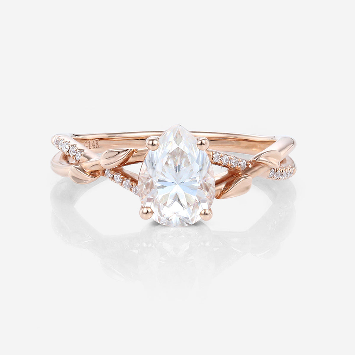 Nature Inspired Pear cut Moissanite Leaf Gold Engagement Ring