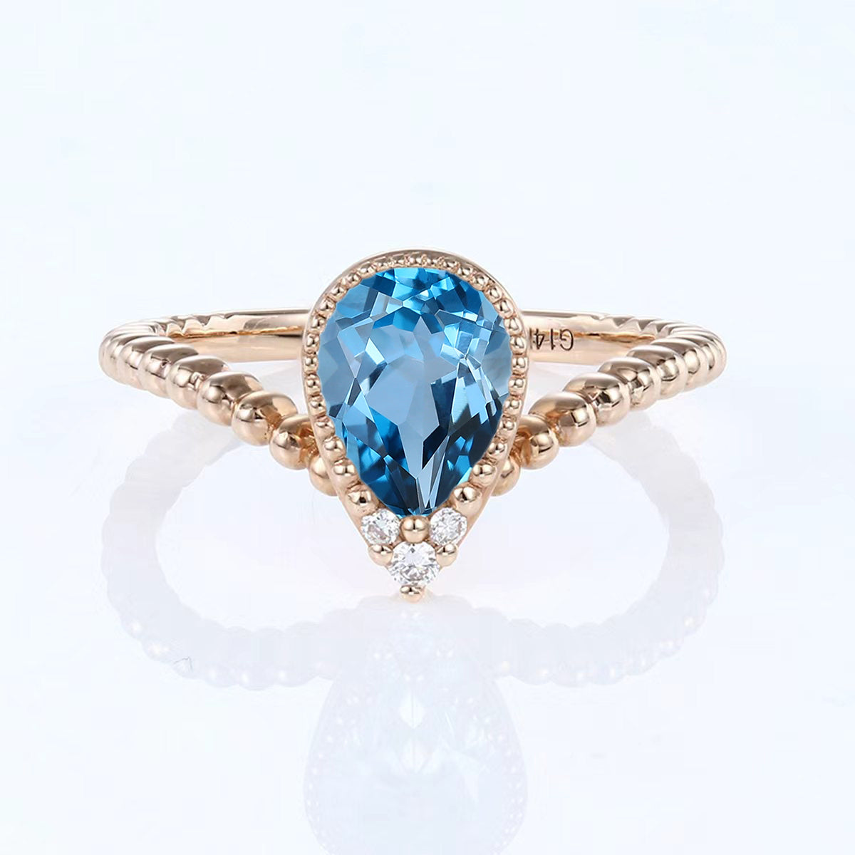 Bezel setting Marquise cut London Blue Topaz Gold Engagement Ring