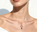 Pear cut Lab Emerald Pendant Necklace with Moissanite Halo Accents
