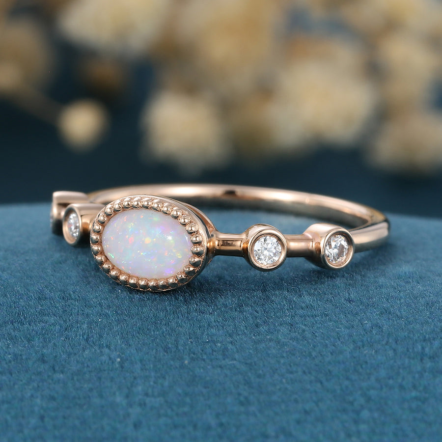 Bezel setting Oval cut Opal Gold Engagement Ring