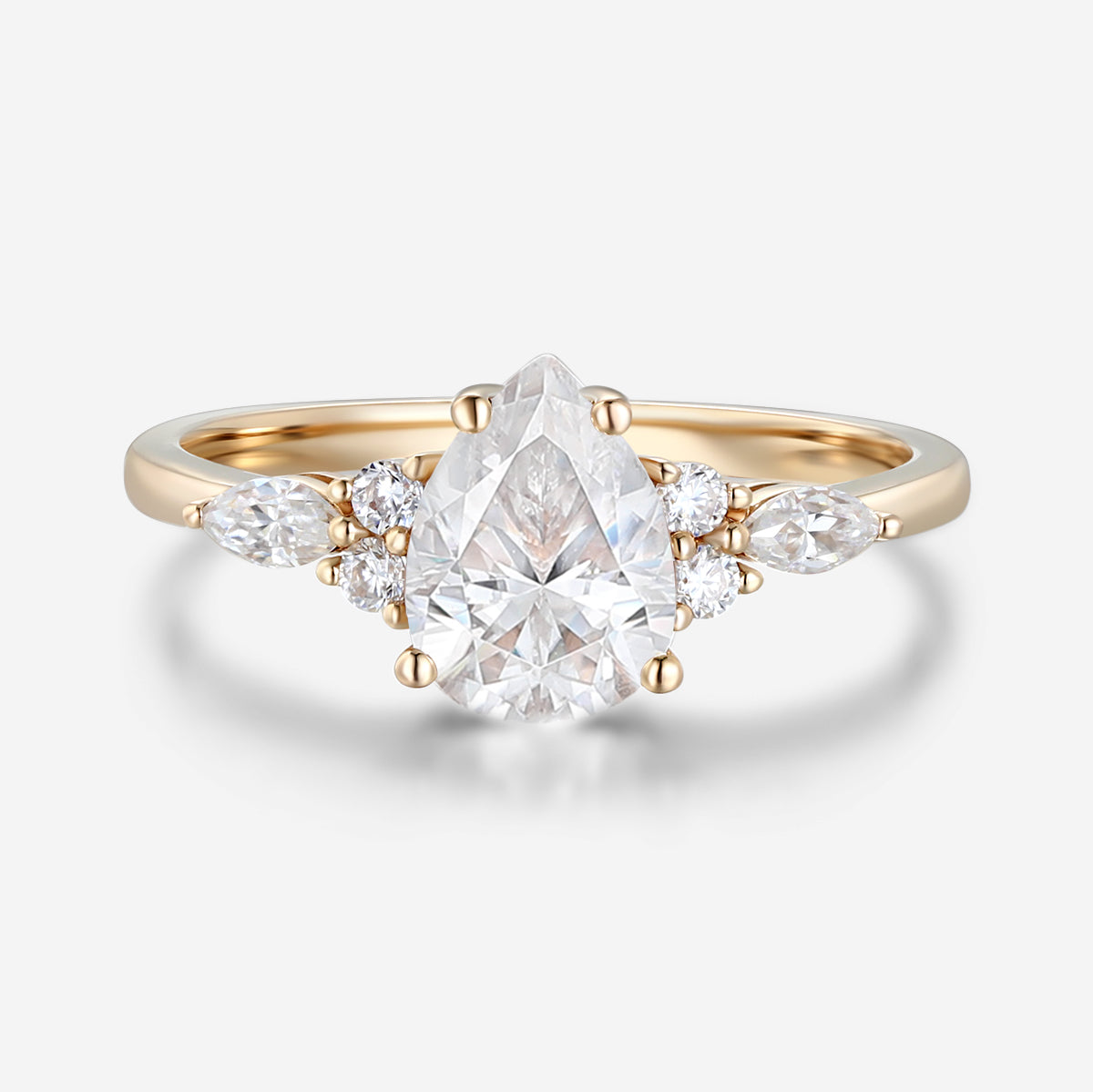 1.25 Carat Pear cut Moissanite Cluster Engagement ring