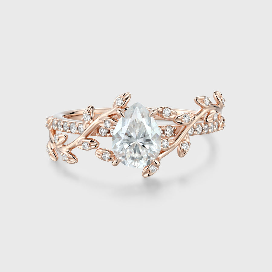 Nature Inspired Pear cut Moissanite Leaf Gold Engagement Ring